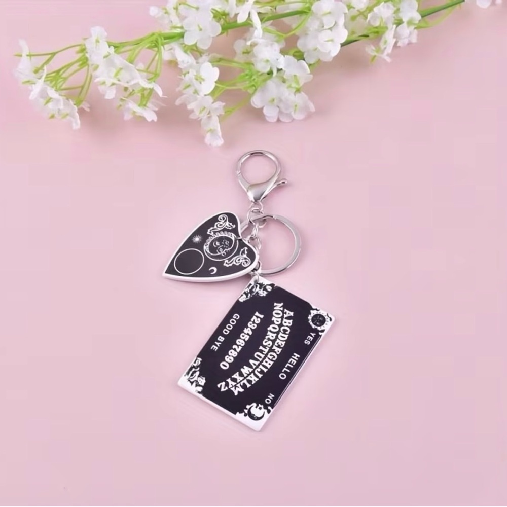 ⭐️ Silver and Black Ouija Keychain Set